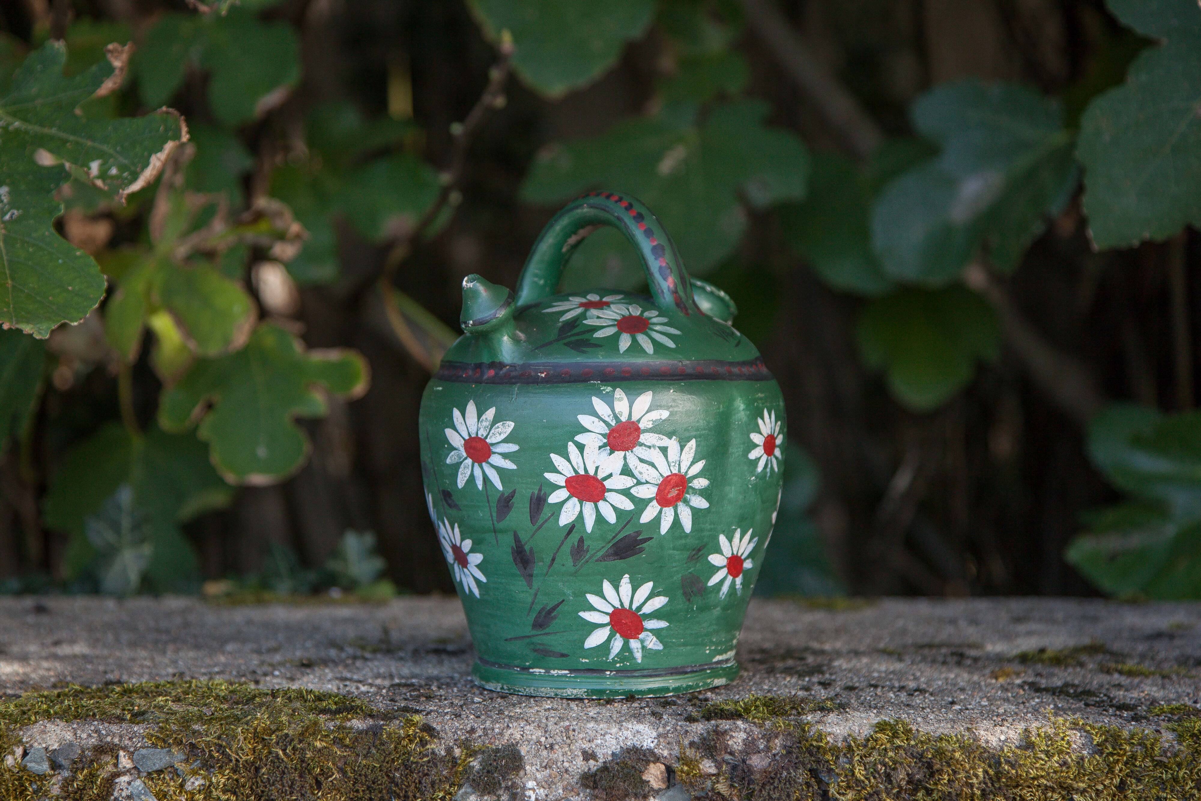 Vintage gargoulette, jug, green painted pitcher with daisy patterns