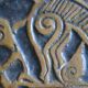 Bas-relief sculpture in terracotta inspired by the Celtic bestiary