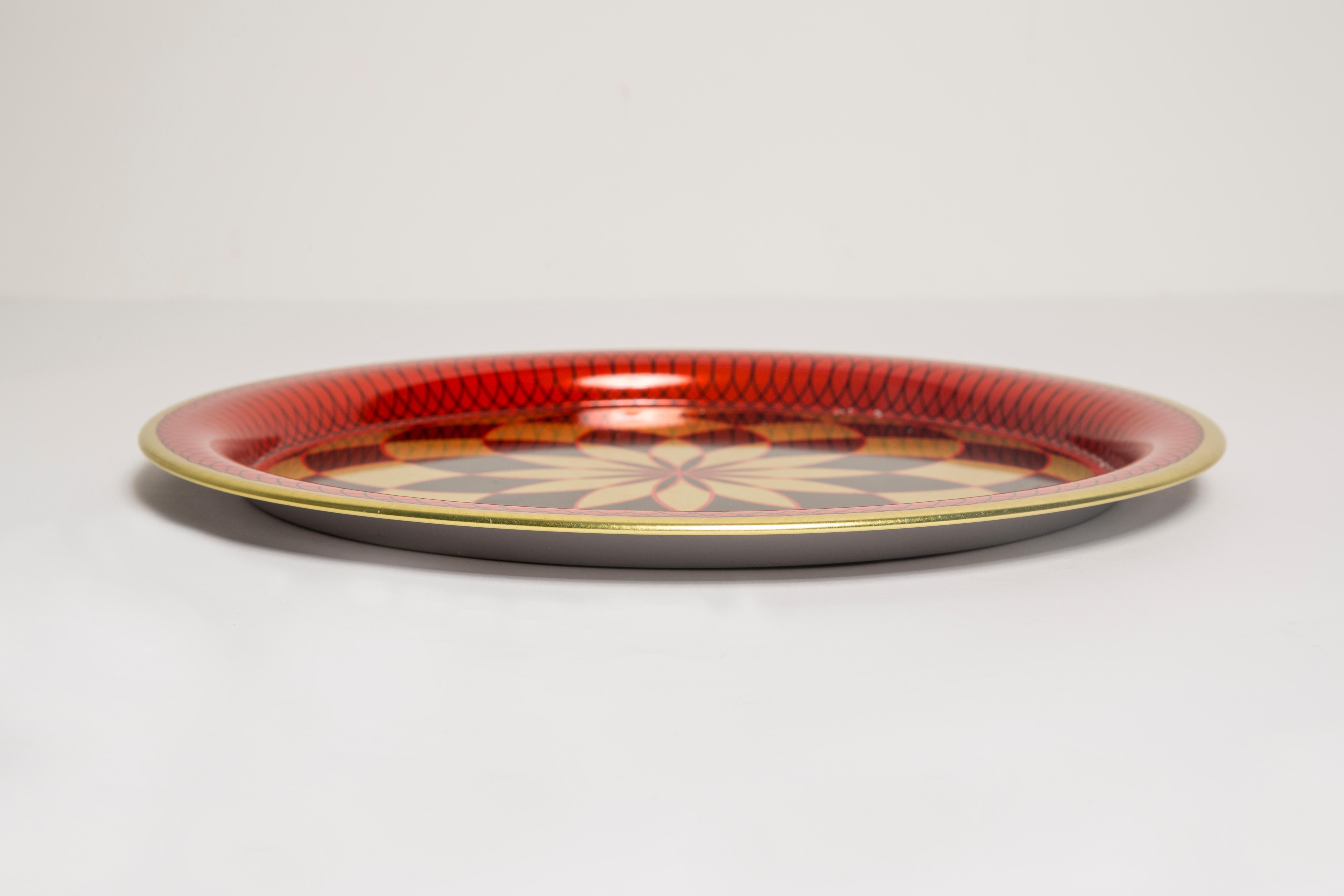 Vintage decorative plate in red, black, and gold metal, Poland, 1960s.