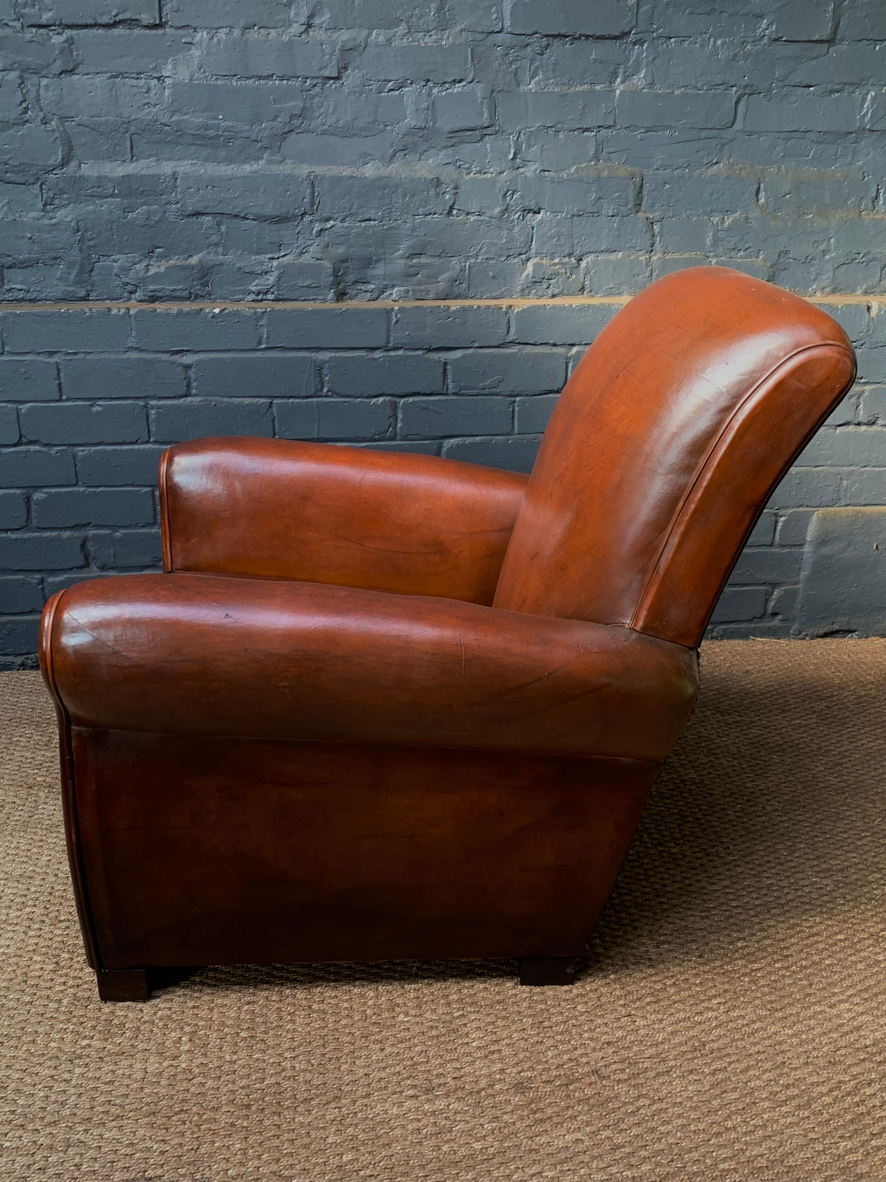 French, leather club chair, havana lounge model circa 1950's