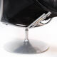 Easy chair with stool upholstered with black leather of Danish design, 1970s