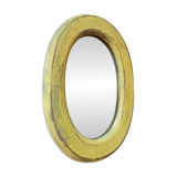 Small antique oval mirror