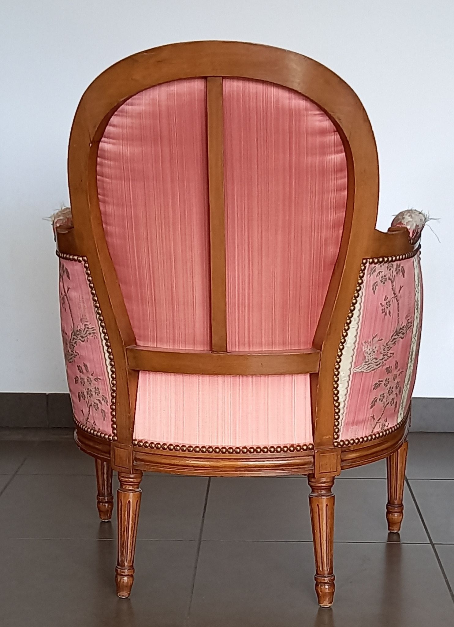 Pair of Louis XVI style armchairs in walnut and pink silk and ecru