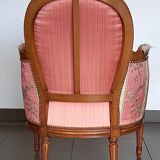 Pair of Louis XVI style armchairs in walnut and pink silk and ecru