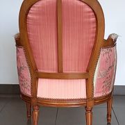 Pair of Louis XVI style armchairs in walnut and pink silk and ecru