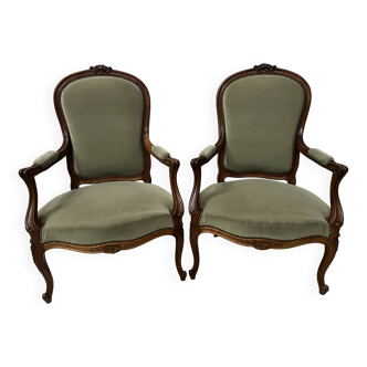 Pair of Louis XV style armchairs in solid walnut, 20th century.