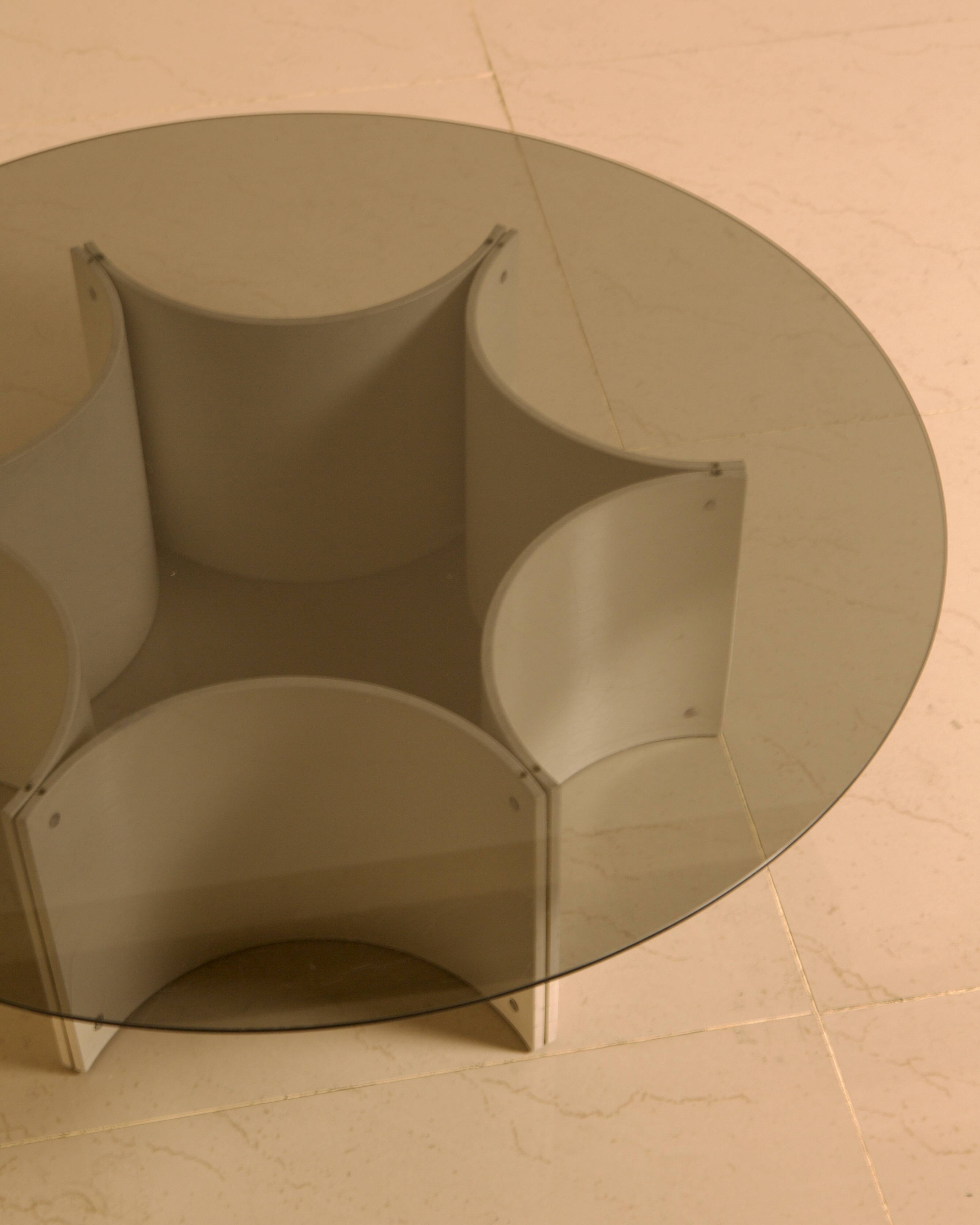 "Space Age" coffee table with star base and smoked glass top from the 70s.