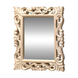 20th century wall mirror with beveled edges and wooden frame