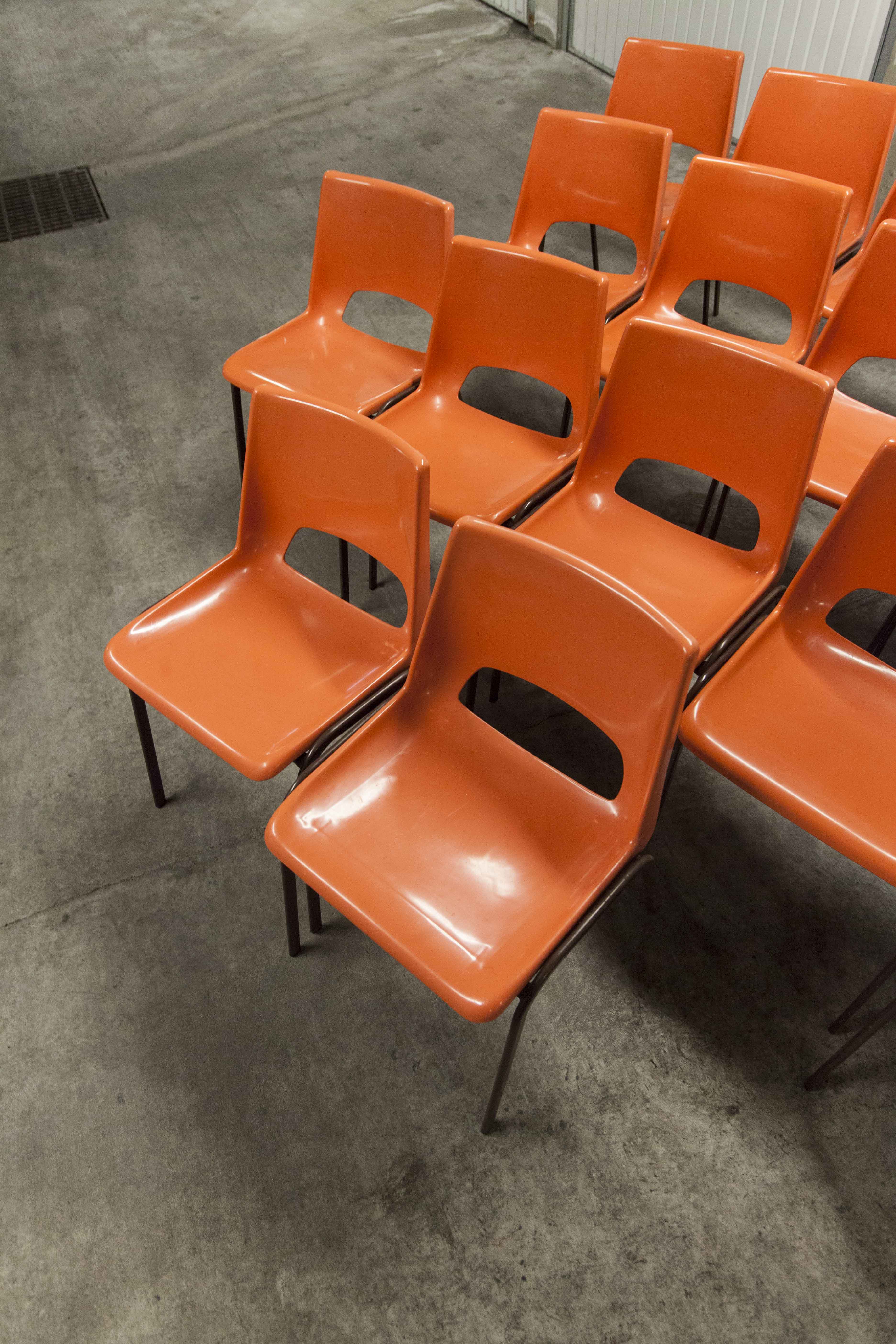 Set of 17 vintage orange chairs 1970