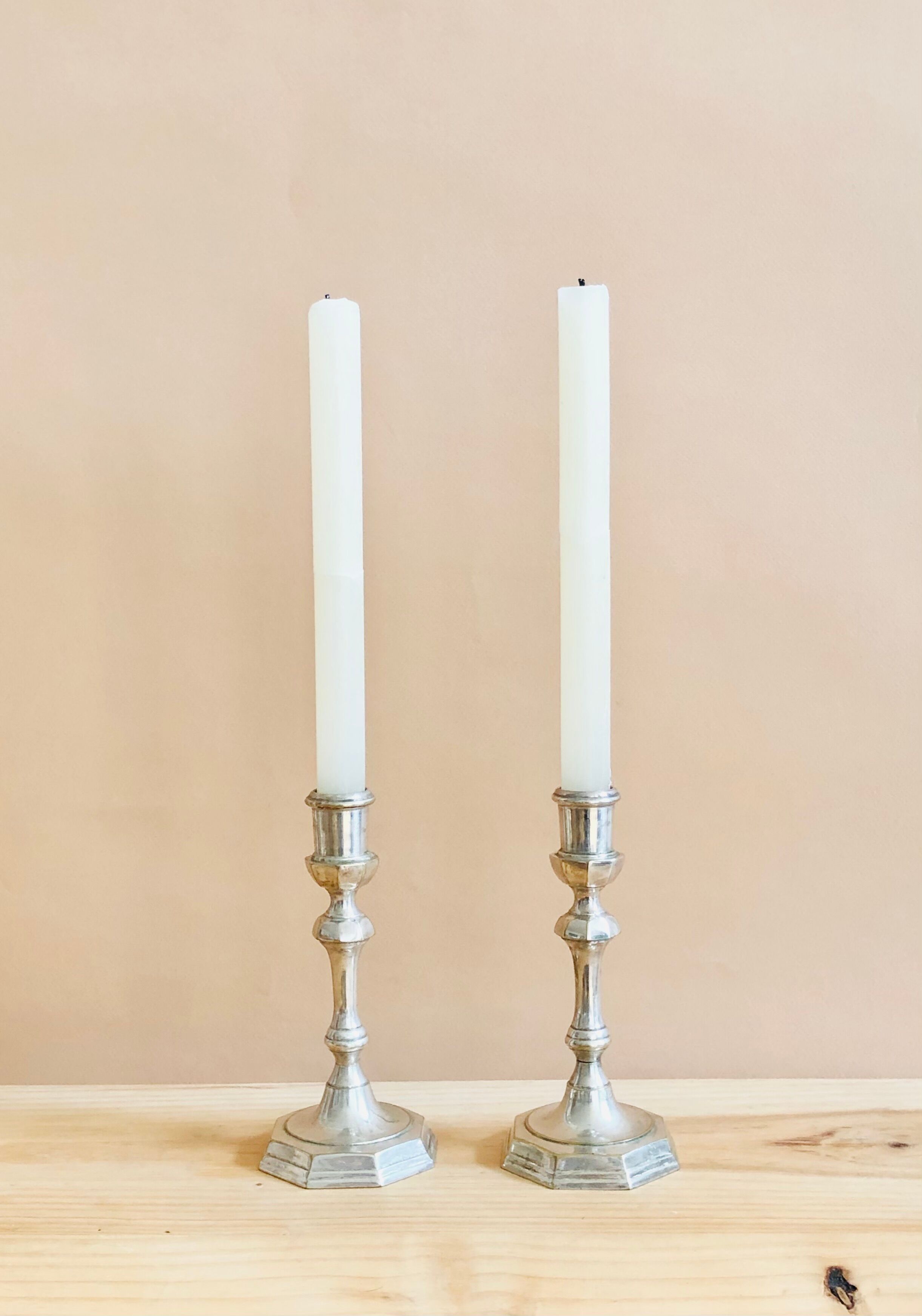 Pair of Pioneer EPNS silver-plated nickel candlesticks