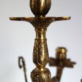 Pair of cherub candle holders in gilded bronze, early 20th century.