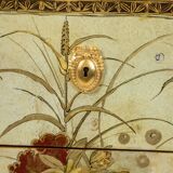 Empire style chest of drawers in lacquer, bronze and marble. Nineteenth century.