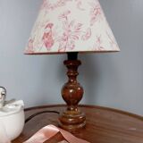 Table lamp with cream/pink toile de Jouy shade, turned wooden base 1960