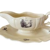 Antique sauce boat in Sarreguemines earthenware.