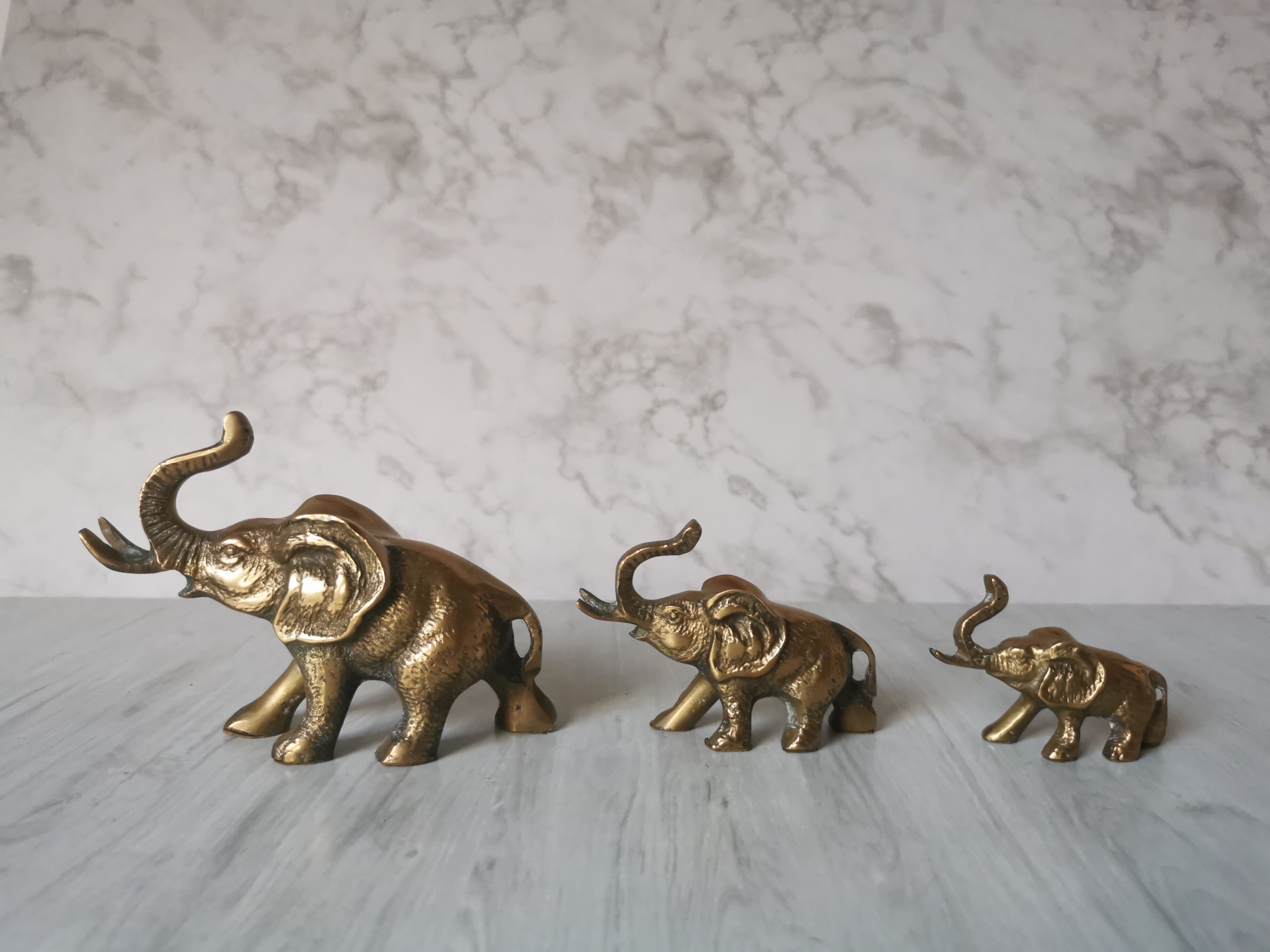 Trio of brass elephants