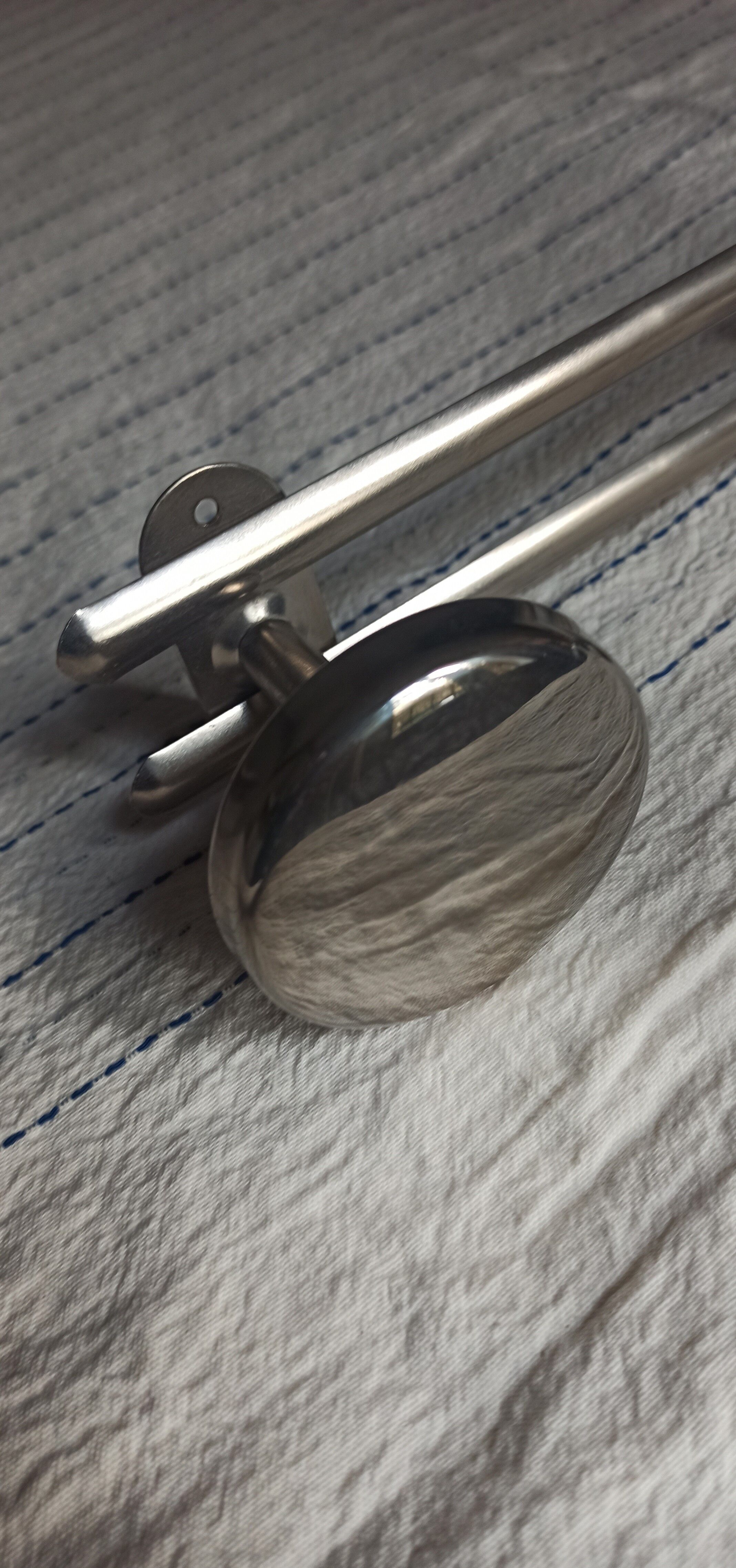 Metal wall coat rack