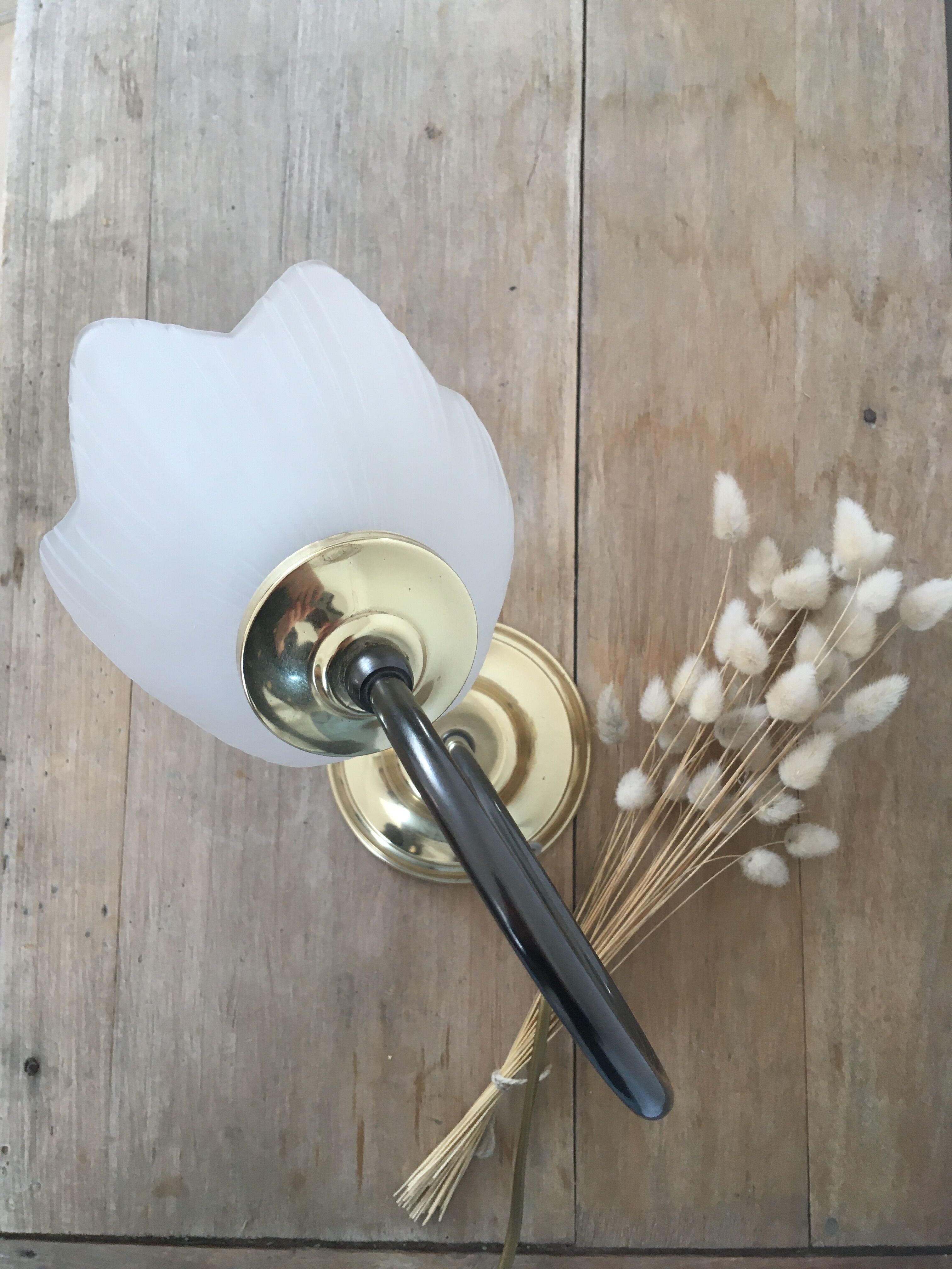 Table lamp with glass globe and brass foot