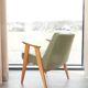 Vintage olive green bouclé armchair model 366
