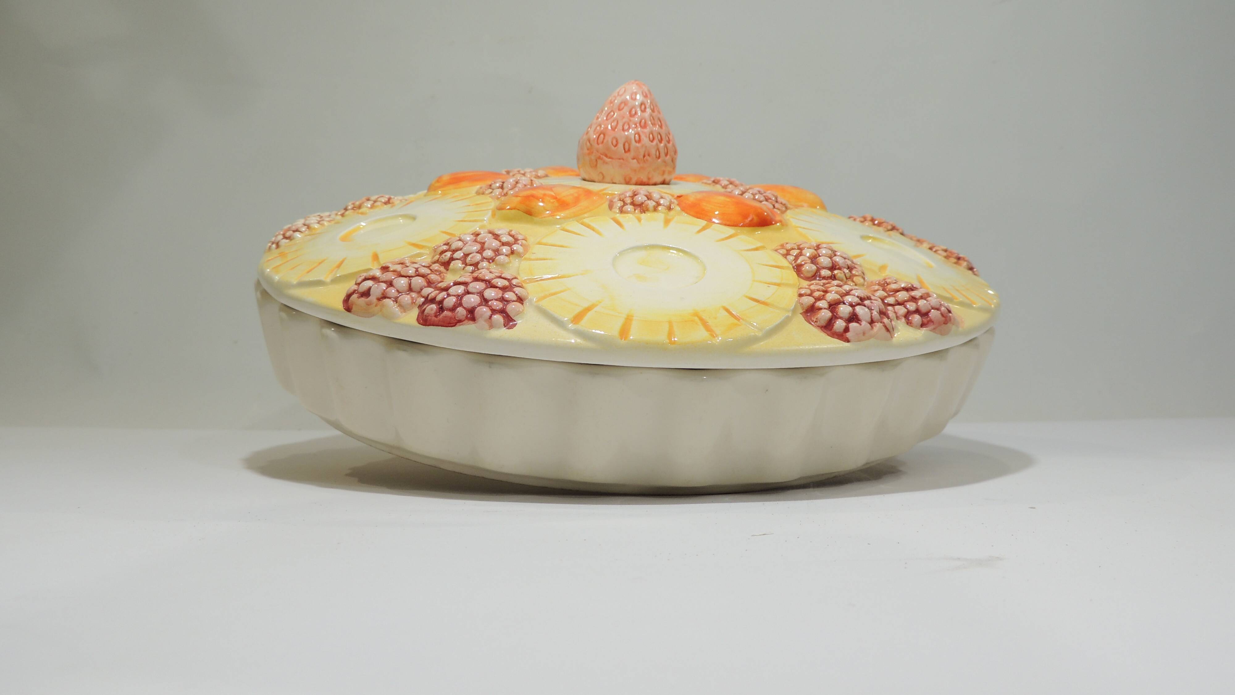 Magnificent fruit tart dish in slip signed "What's Vincent Cadeaux