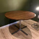 Vintage round table 110 cm in rosewood, tulip base, 1970s.