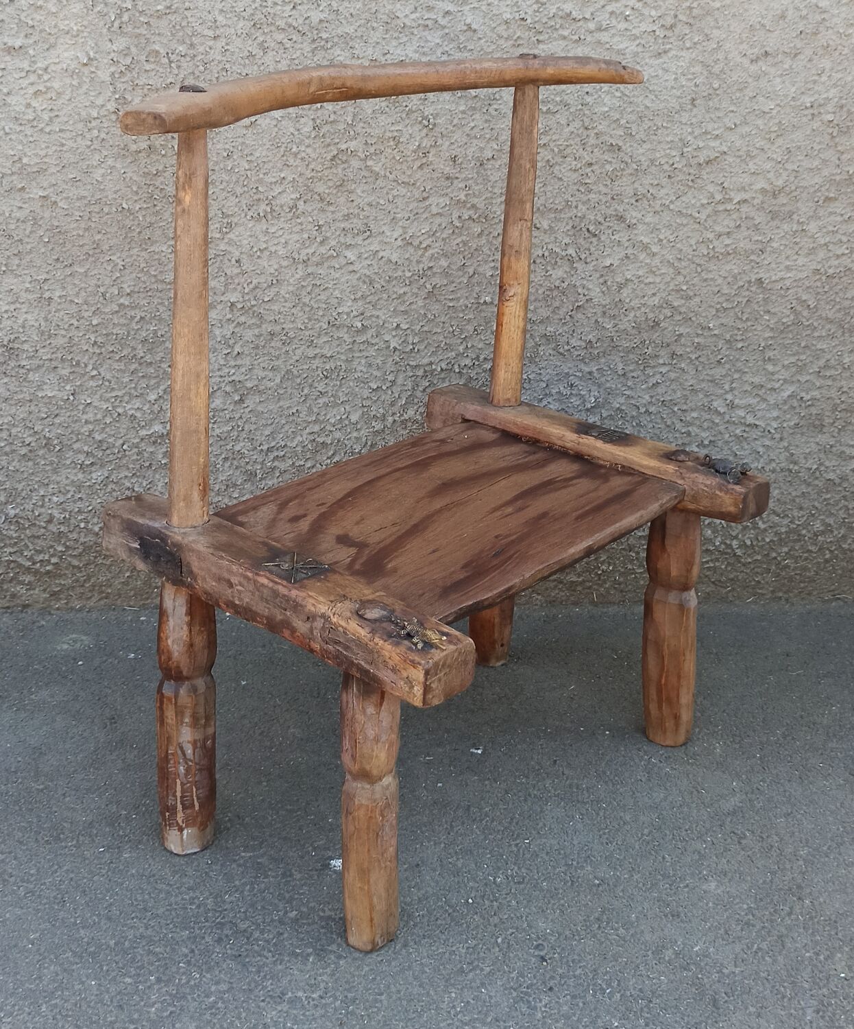 Antique wooden stool. Baoulé African art from Ivory Coast.