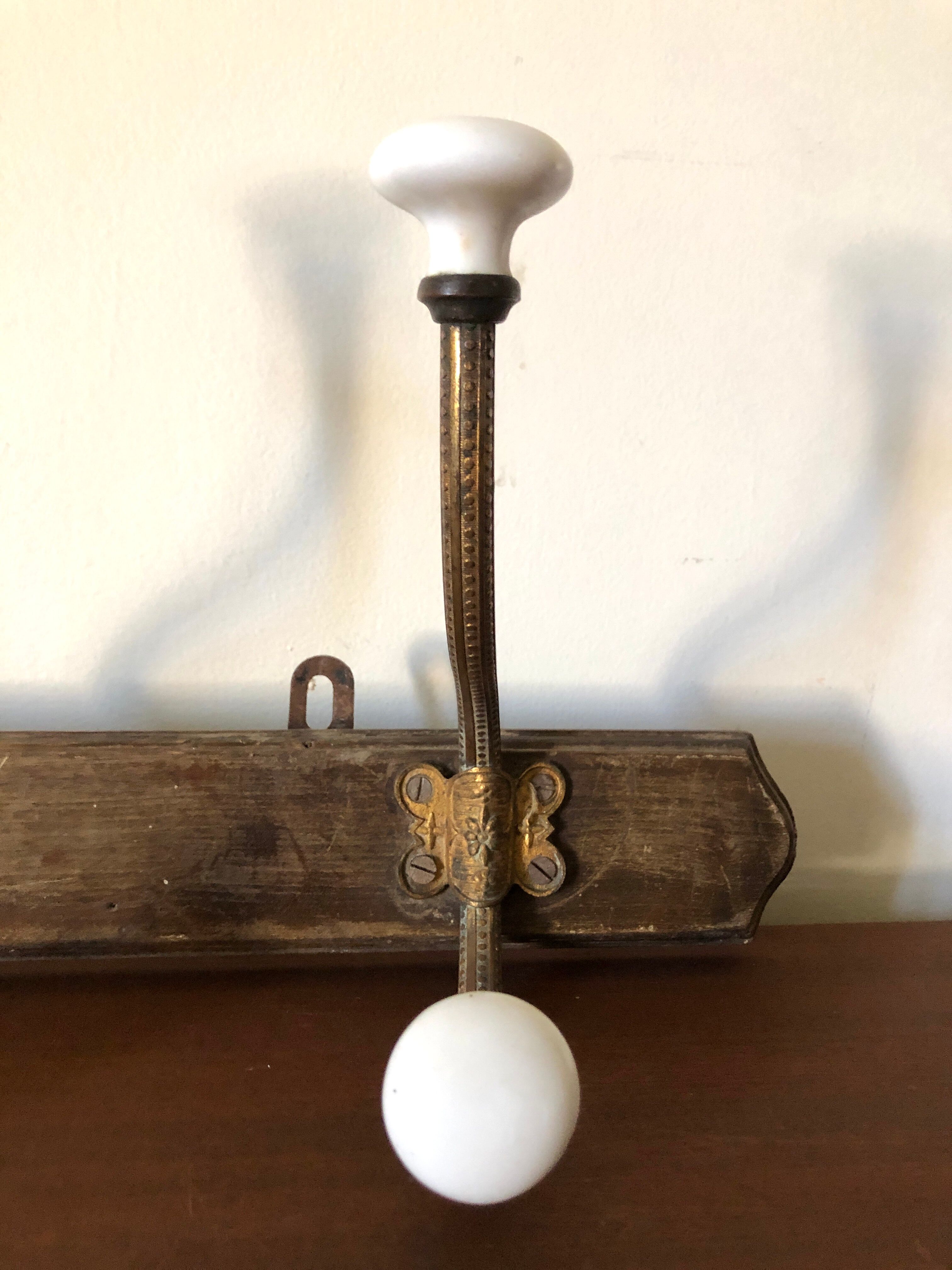 Coat rack 1900 in wood, ceramic and wrought iron
