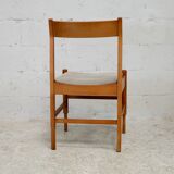 5 chaises en bois piètement fuselé circa 1975