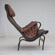 Années 1970, design suédois de Bruno Mathsson, modèle « Pernilla », cuir.