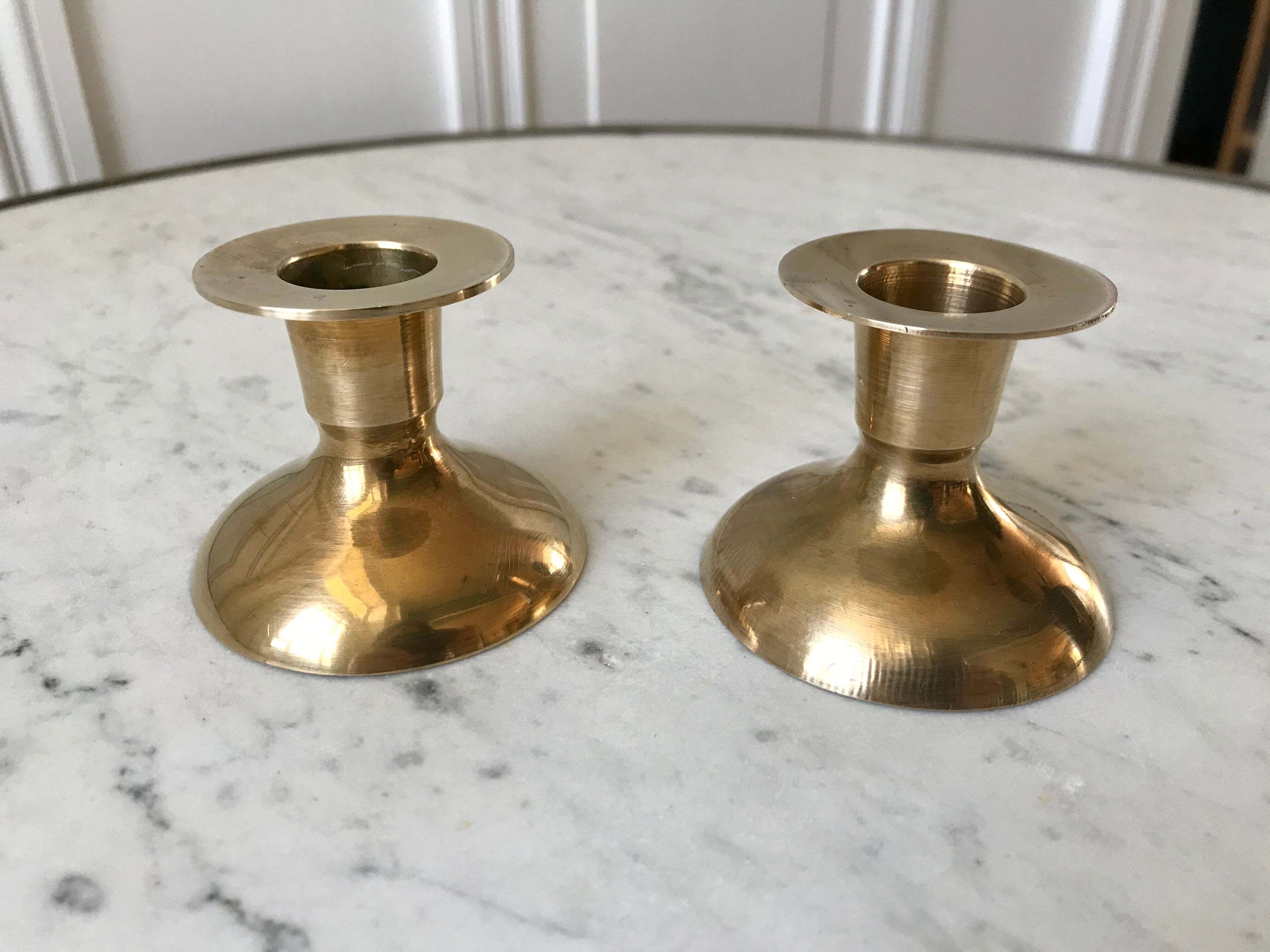 Duo of brass candle holders 20s