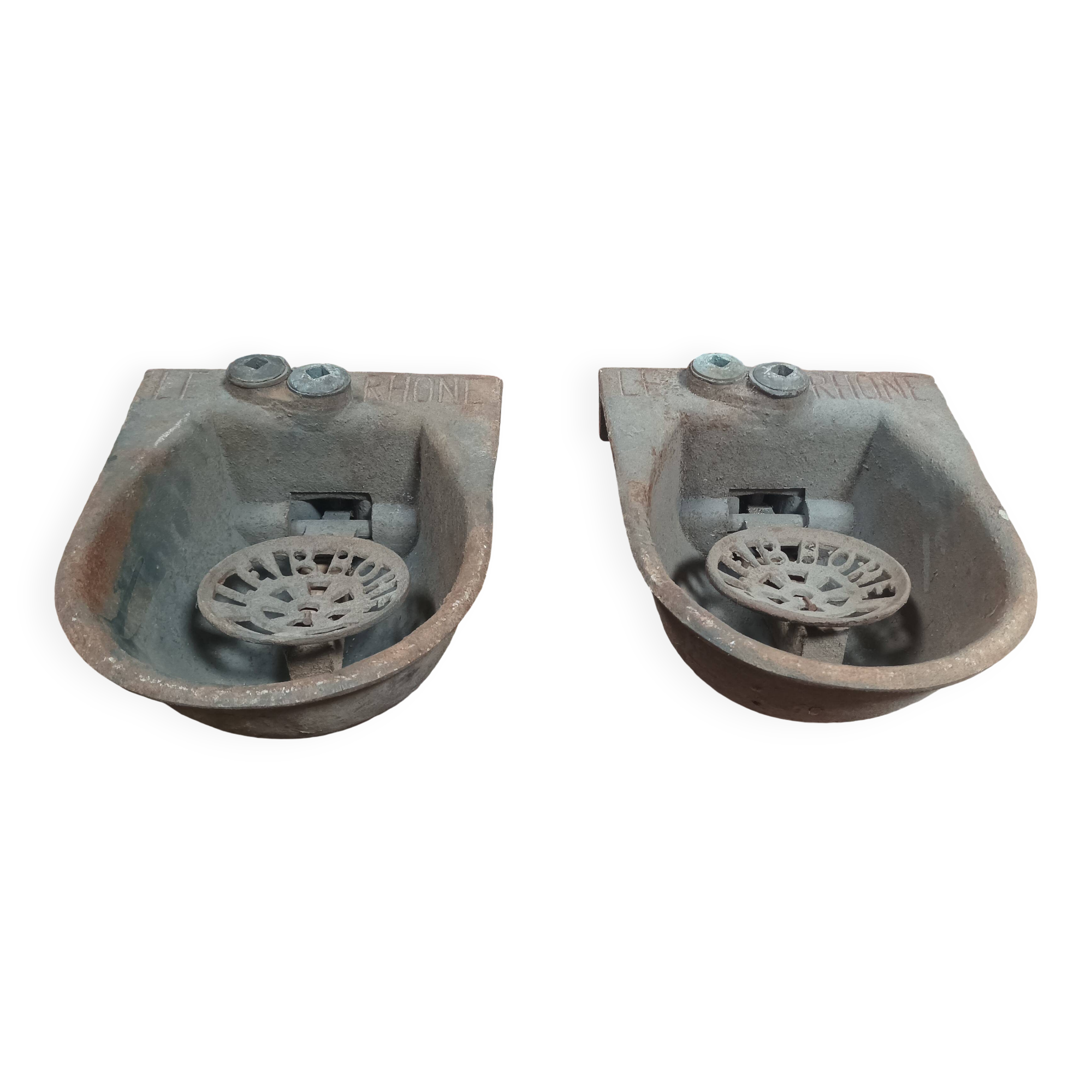 Pair of old cast iron Le Rhône drinking troughs