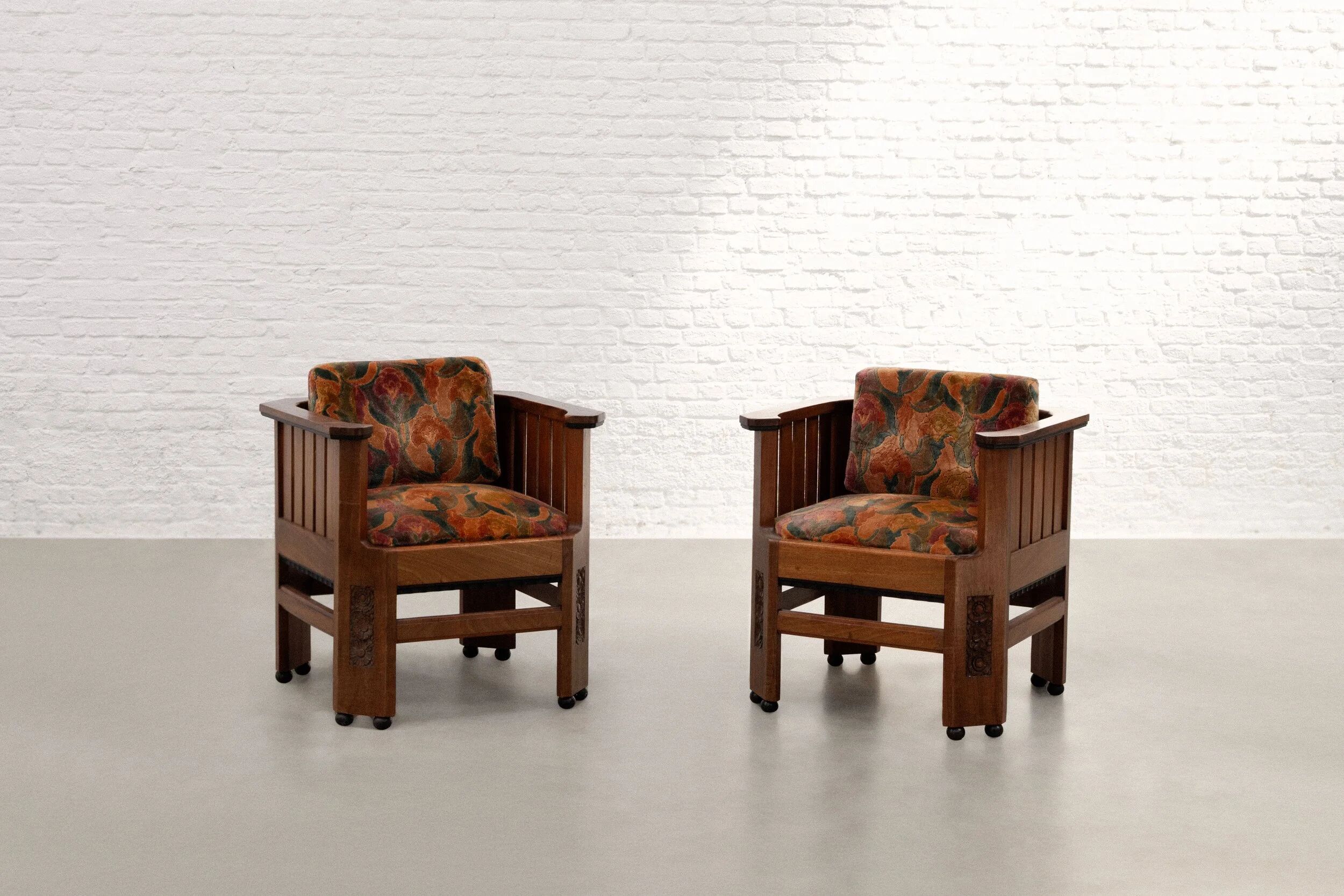 Pair of Amsterdam School walnut armchairs, Netherlands, c. 1930