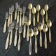 23 seats: 12 forks, 11 spoons, silver metal, 2 punches