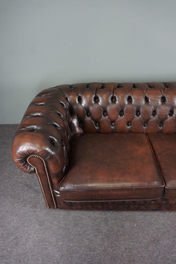 Chesterfield sofa in cowhide, 4 seats