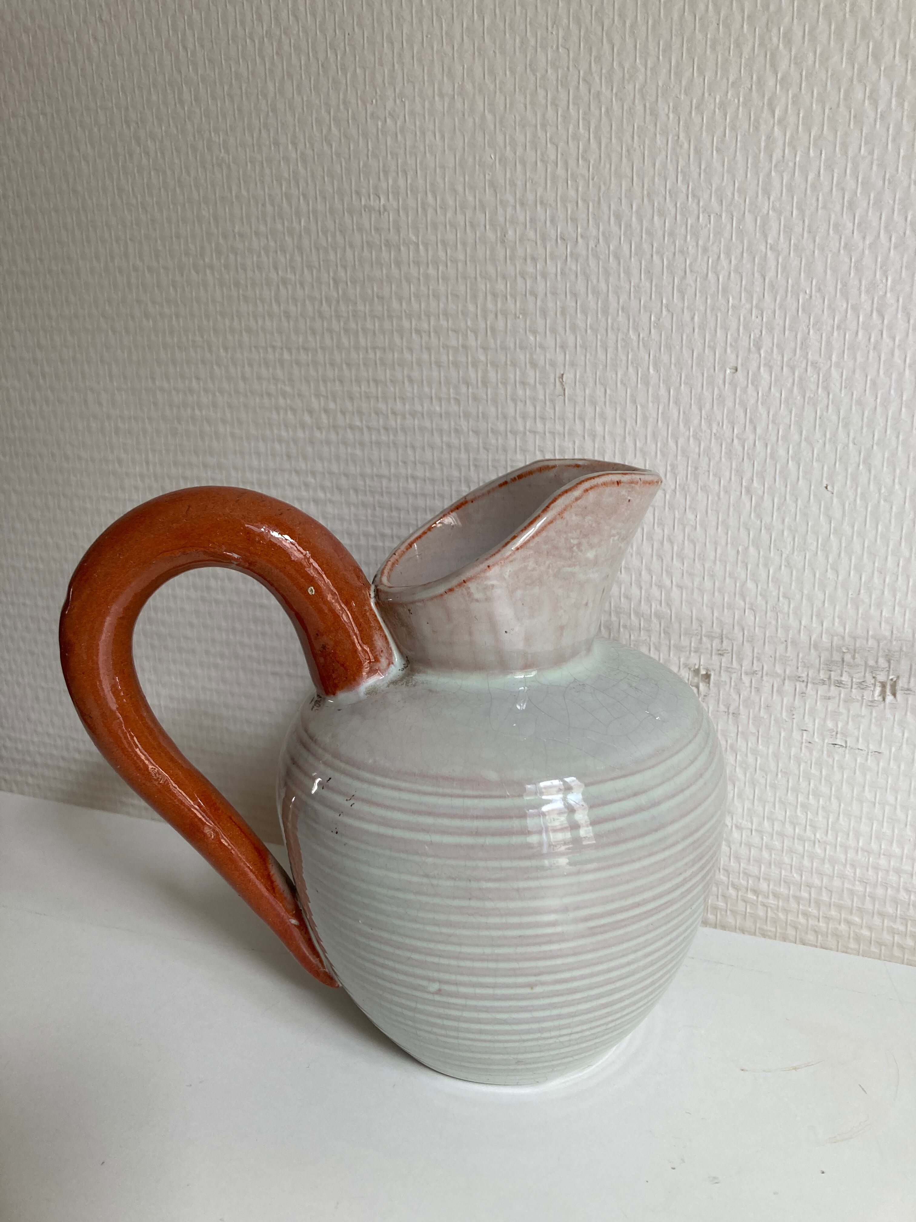 Small pitcher in sandstone