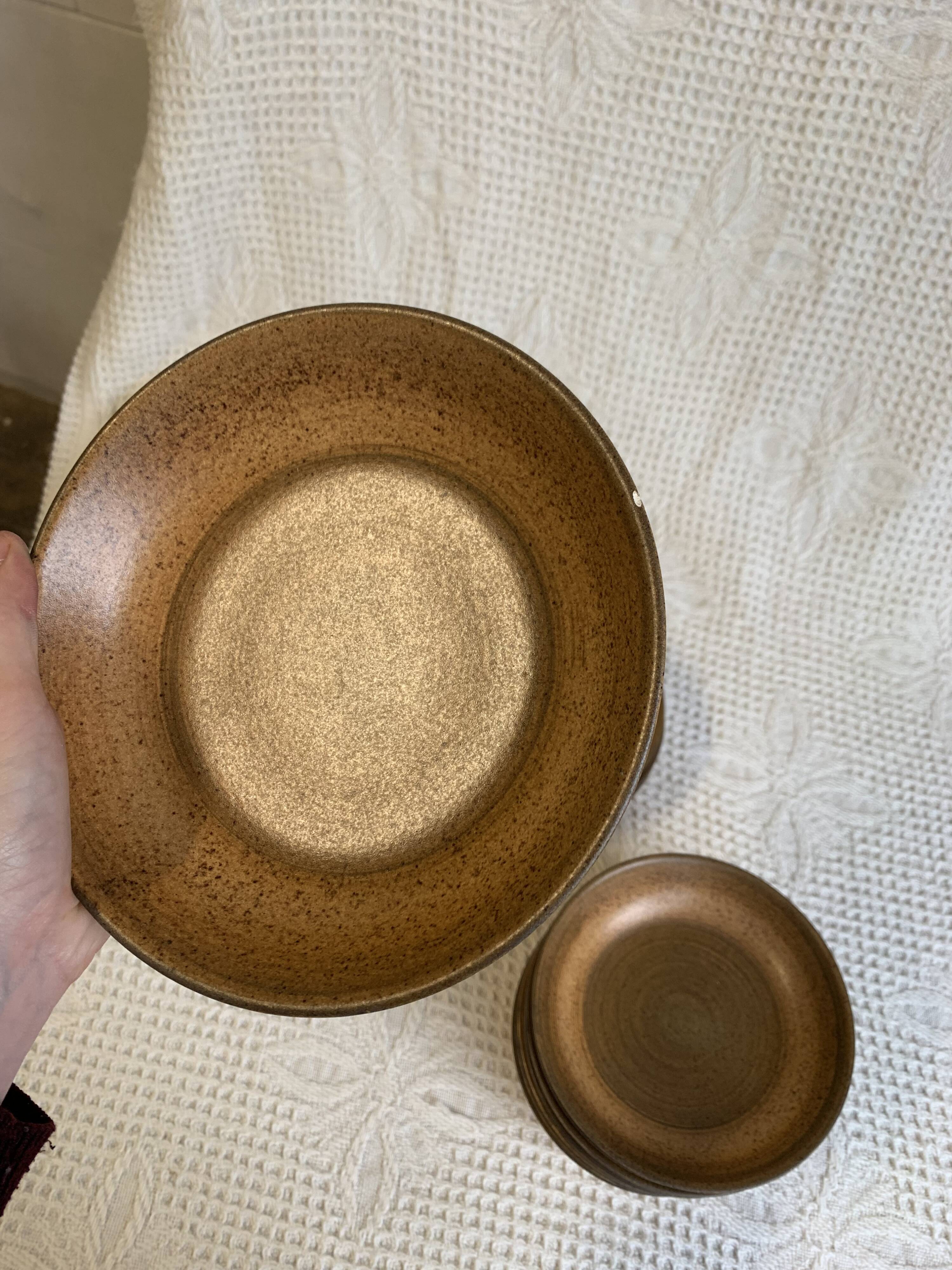 6 Longchamp brown enameled stoneware soup plates, 1970s