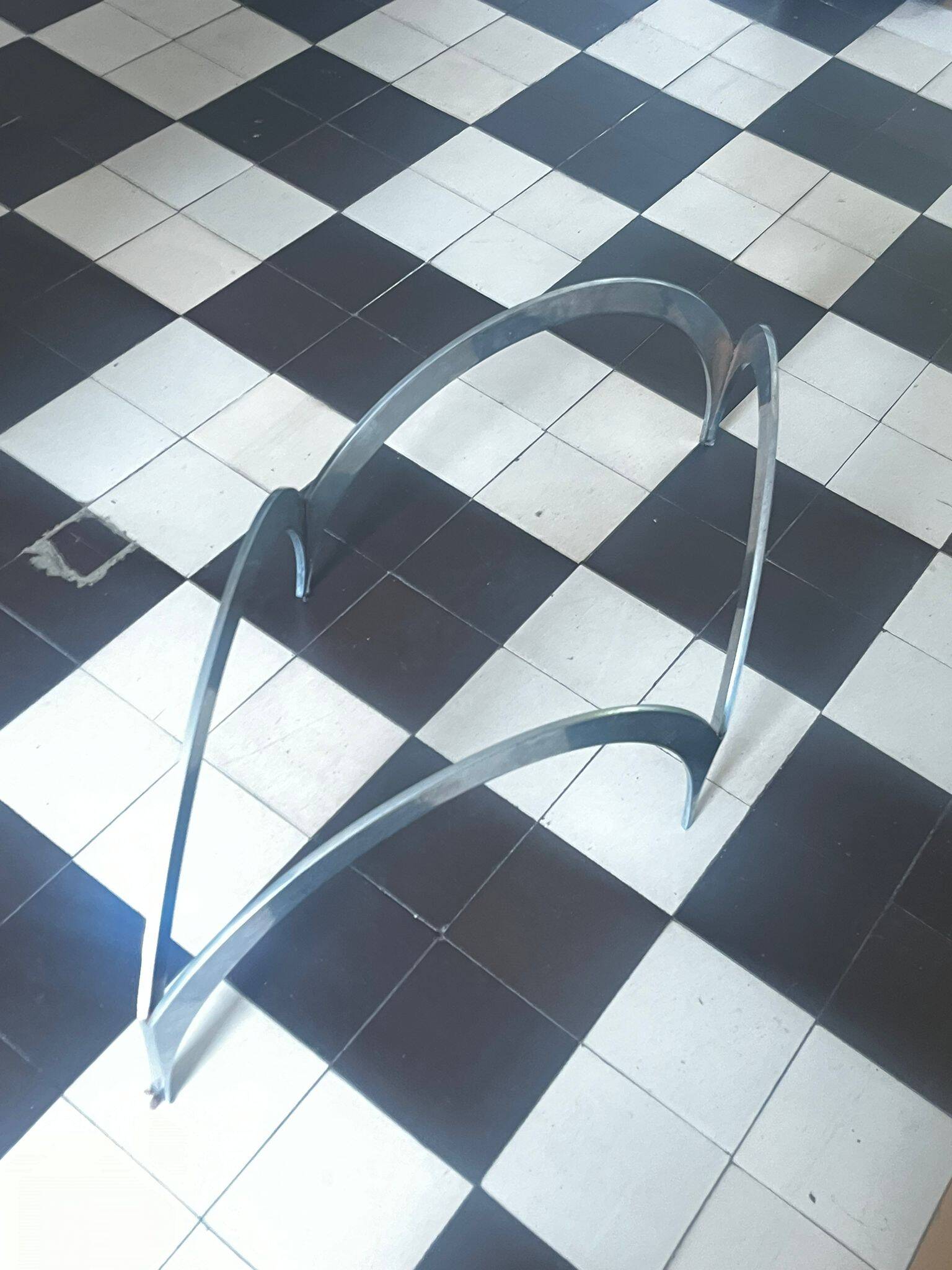coffee table with metal legs and smoked glass top