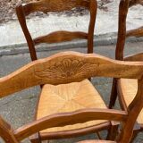 4 Louis XV chairs in solid oak with rush seats, shell carvings, 19th century.