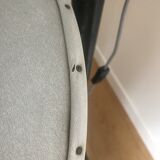 Vintage hairdresser's armchair with helmet transformed into a lamp