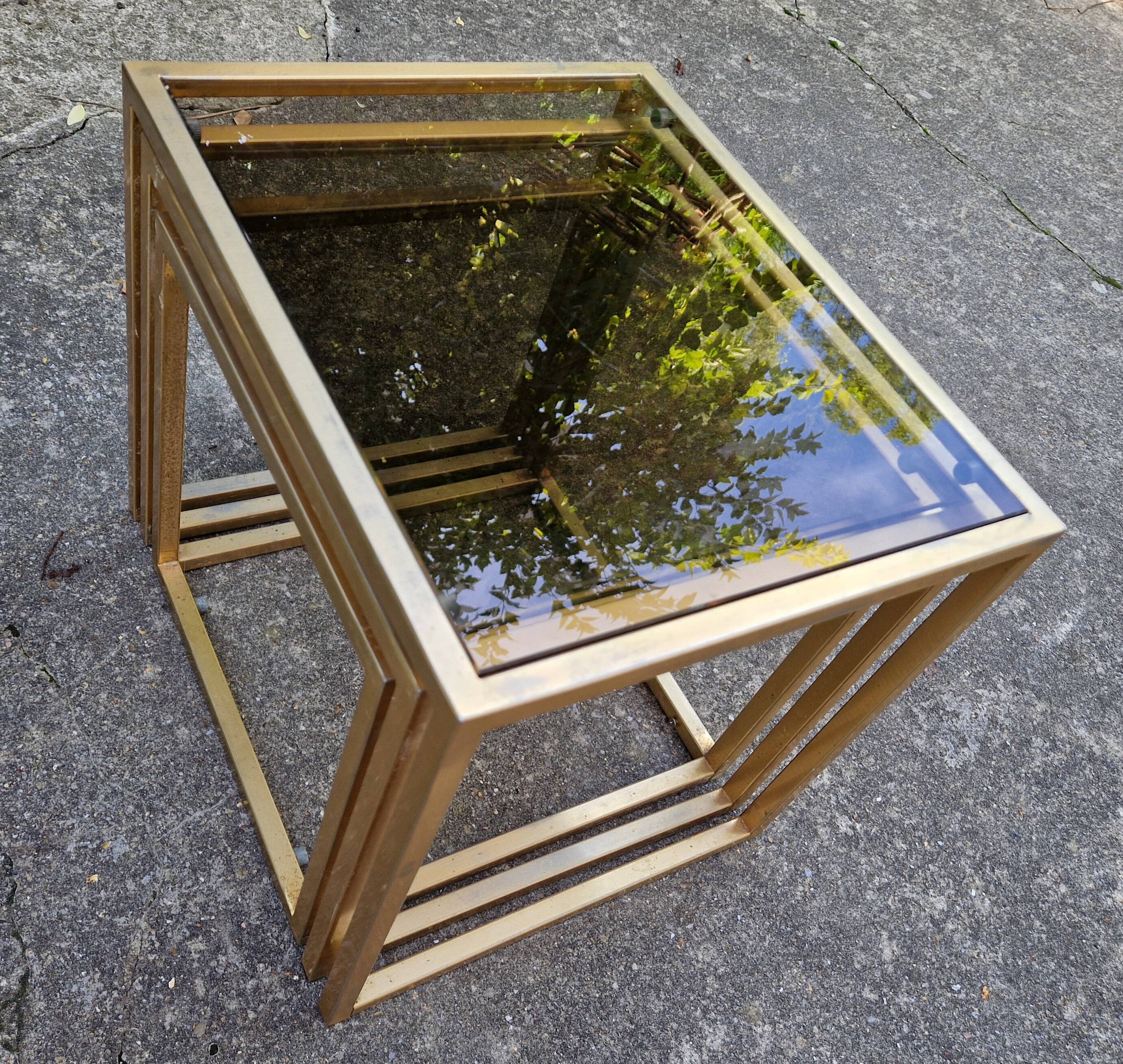 Vintage 1980s gold metal and smoked glass nesting tables