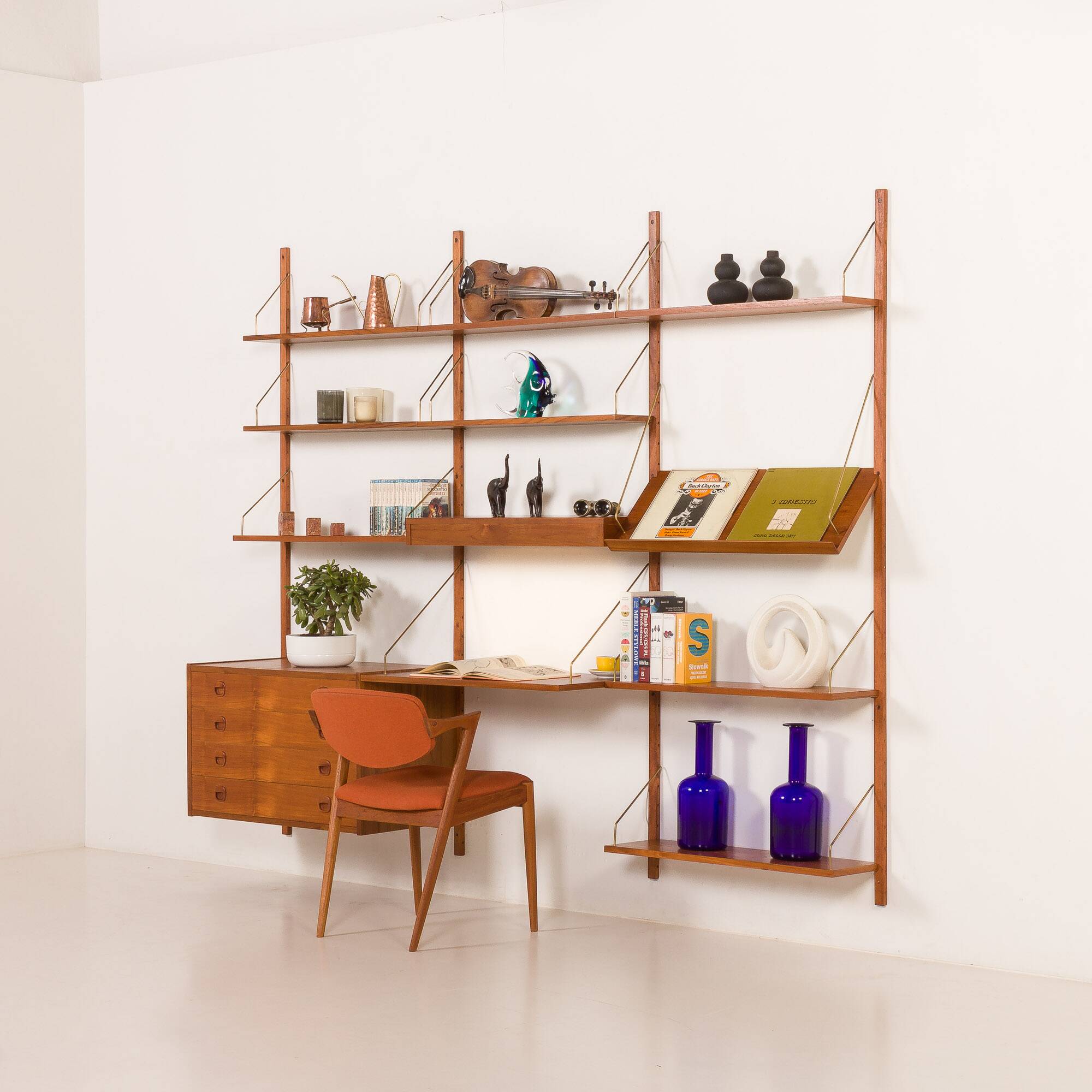 Danish teak wall unit in the style of Cadovius, Sorensen with a lamp, 1970s