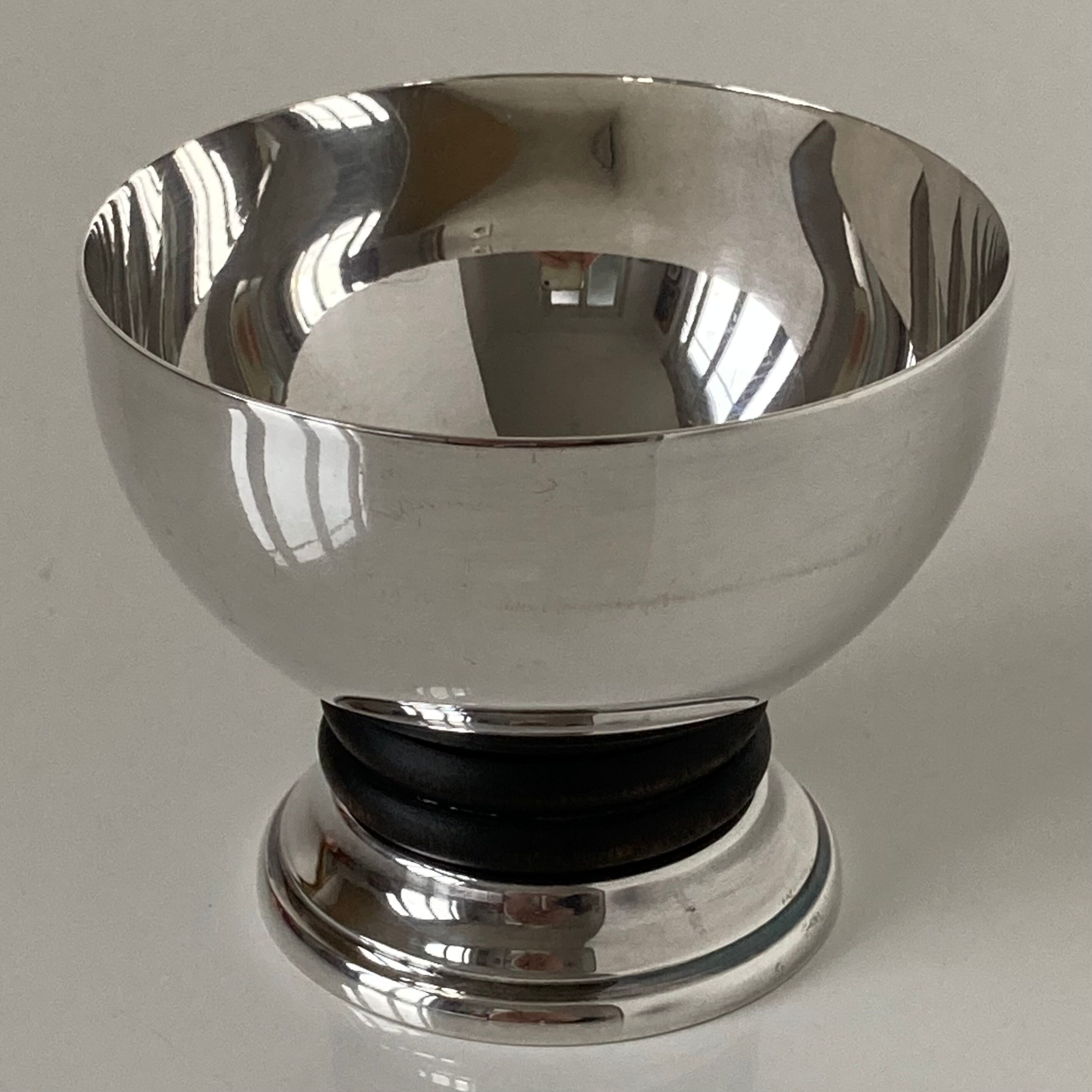 Beautiful Art Deco standing cup forming pocket trays in silver metal and blackened wood