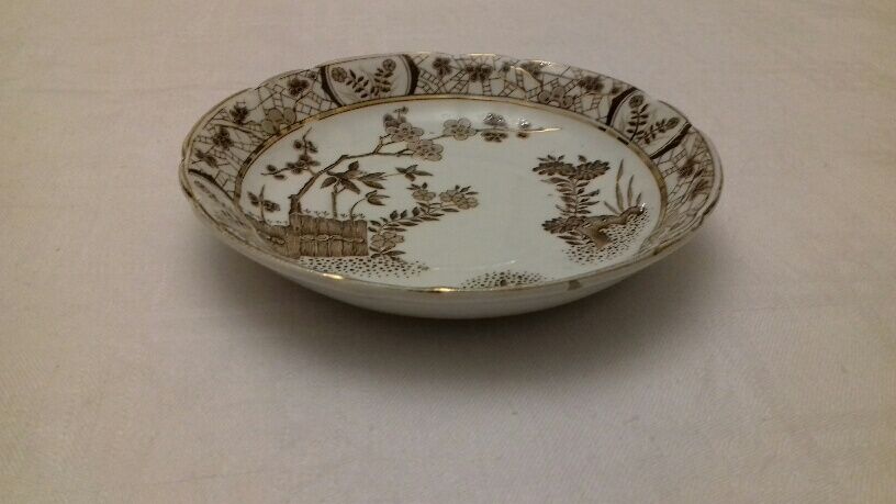 Set of 11 plates and 11 earthenware cups