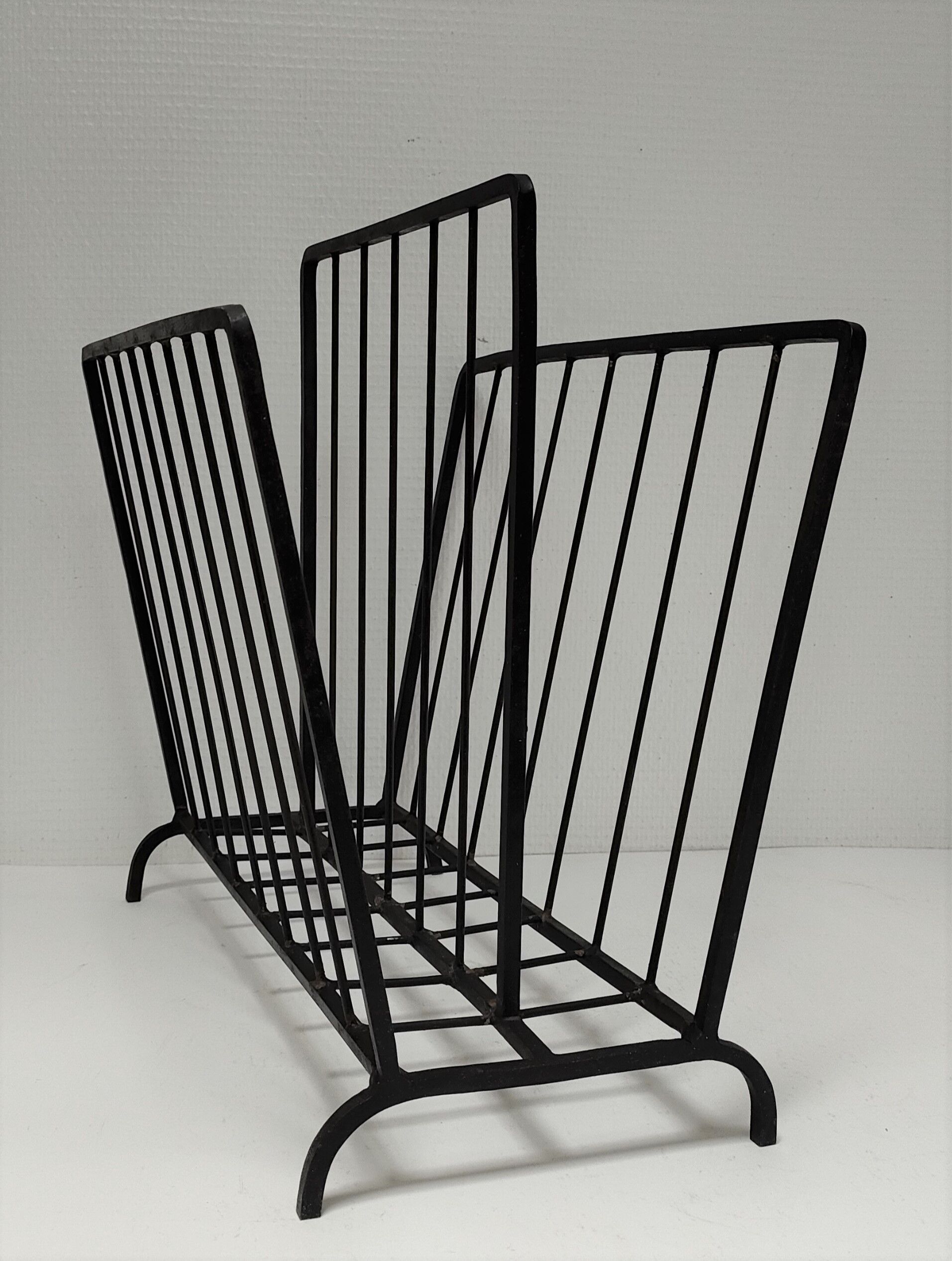 Modernist magazine holder black iron 60s