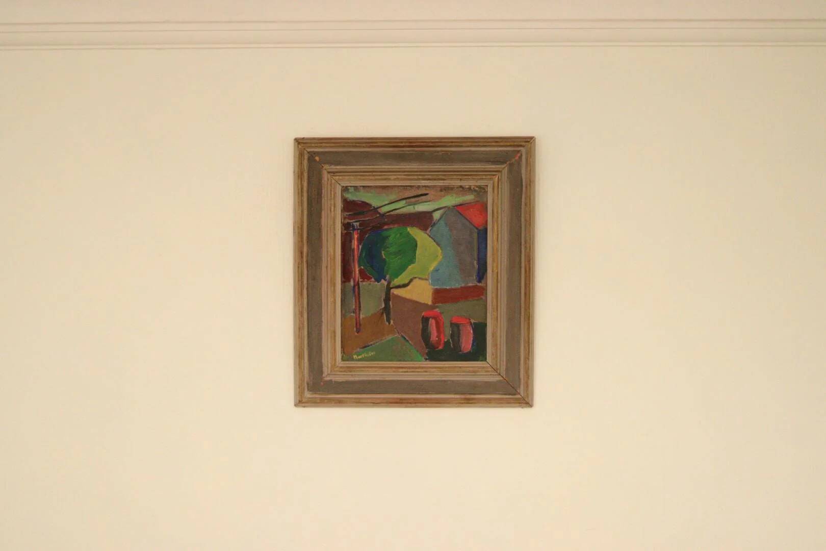 House obscured by a tree by Harry Martinson