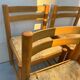 4 vintage chairs made of solid wood and woven straw
