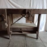 antique workbench with one drawer and two vices