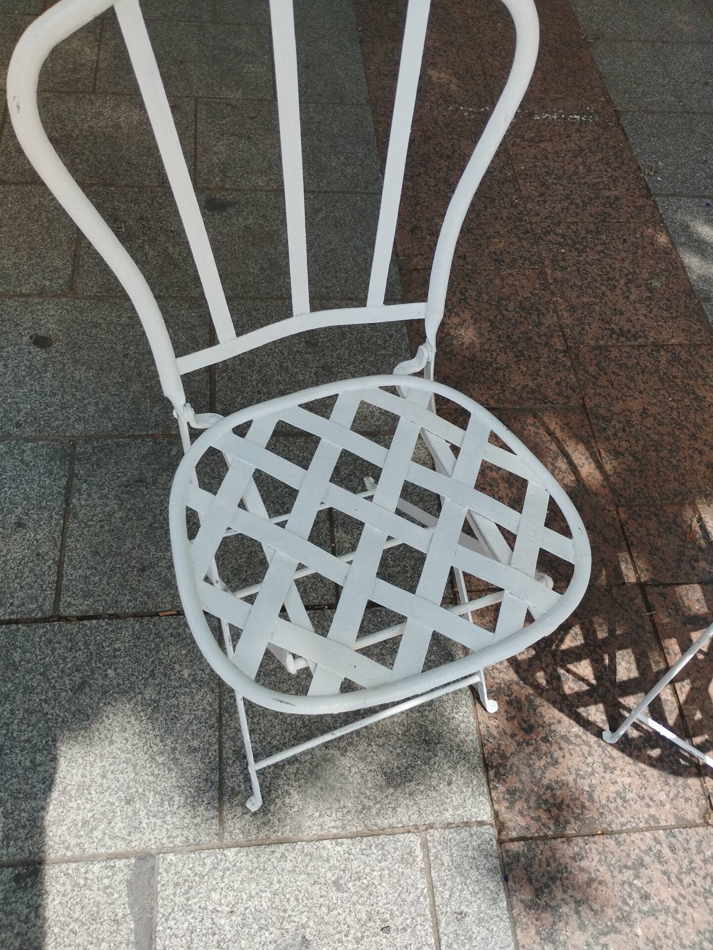 Antique garden furniture in solid wrought iron.