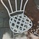 Antique garden furniture in solid wrought iron.
