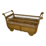 Wooden and rattan baby bed