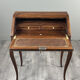 Secretary with a drop-down front in marquetry, Louis XV style, 19th century.